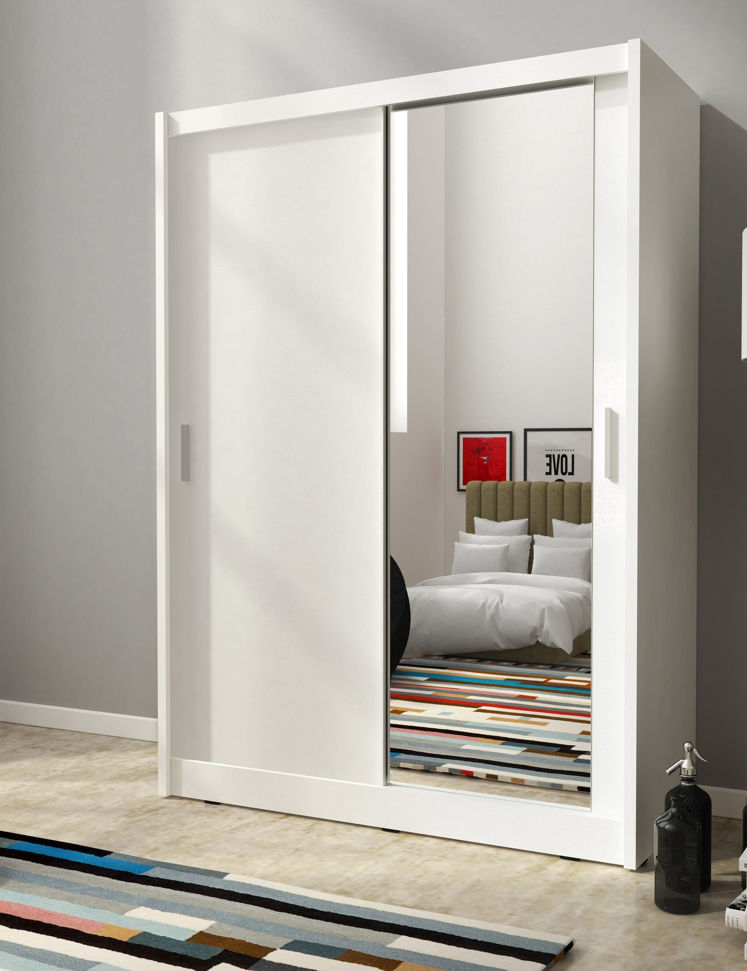 SLIDING DOOR WARDROBE MAJA I MIRROR 130CM WHITESliding wardrobes with mirrors - a clever way to optically enlarge the room Maximize your space with the MAJA 1 MIRROR 130CM WHITE sliding door wardrobe. The mirrored panel create the illusion of more room, m
