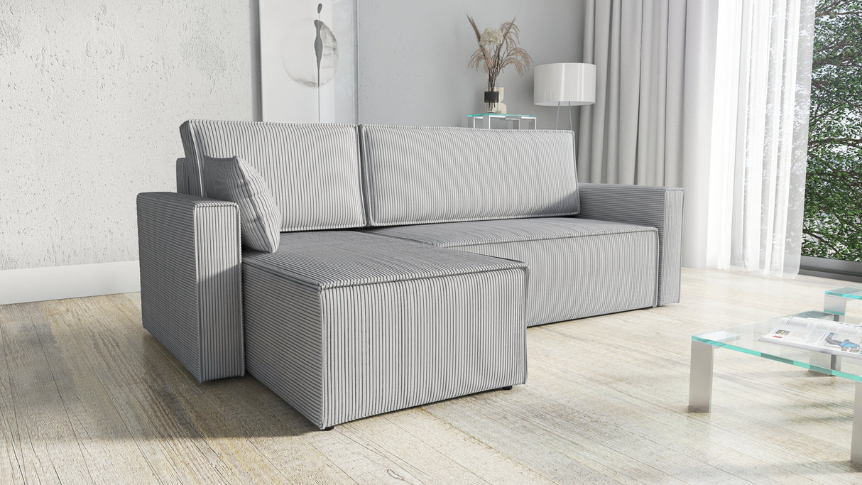 CORNER SOFA BED ROBI 240CM / SPRINGS + FOAM / CHOICE OF COLORThe corner sofa is made of corduroy fabricDimensions:sleeping area 131/206width 240 cmdepth 150 cmheight to the seat 41 cm* dimensions given with a tolerance of +/- 3 cmSpecification:- universal