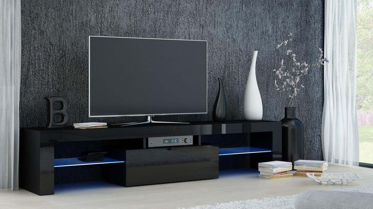 TV STAND DACO BLACK GLOSS FRONTS 160CMWHITE OR BLACK GLOSSTABLE DIMENSIONS 160CM Depth: 40 cmWidth: 160 cmHeight: 45 cmA modern tv table is a practical and elegant piece of furniture, a perfect for people who looking for functional furniture for a modern