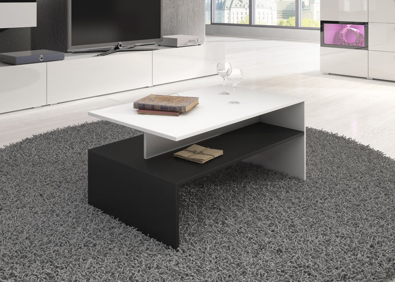 COFFEE TABLE BAROS WHITE/BLACKThe COFFEE TABLE BAROS WHITE/BLACK is designed to fit seamlessly into modern homes. Its compact, versatile design offers a stylish yet functional solution for small living rooms. Made from durable 16mm laminated board, this t