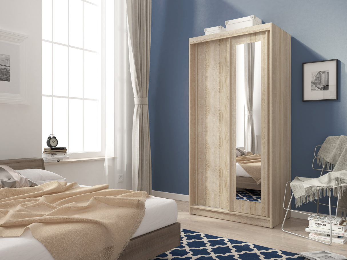 SLIDING DOOR WARDROBE ALASKA 100CM SONOMAHigh-quality laminated board The board is resistant to damage, scratches and high temperatures Modern design Big space The wardrobe has two fronts, One front of the wardrobe is covered with a mirror 1 rail for hang