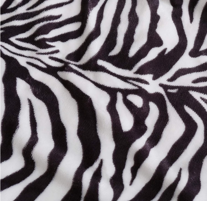 Super Soft Warm Sherpa Fleece Wearable Hoodie Blankets ZEBRA Designs -130 x 180 cmMeet the Super Plush Teddy Fleece Hoodie Blanket, the perfect companion for your cozy nights and cold winter days. Made with love and incredible attention to detail, this bl