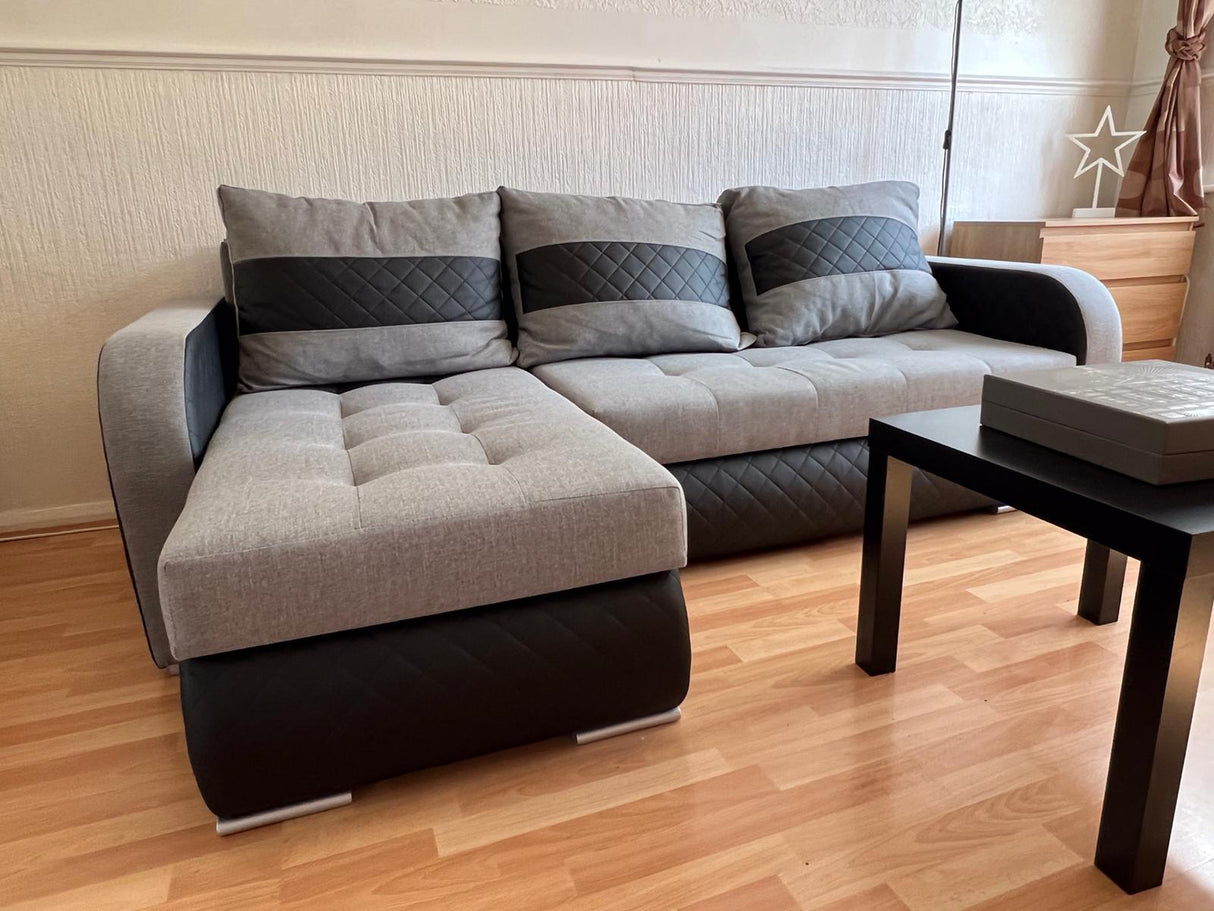 CORNER SOFA BED NESTY INARI 91/W39 228CM 2X STORAGE SPACE UNIVERSAL CORNER / BONELL SPRINGS + FOAMTHIS MODEL IS UNIVERSAL WHICH MEANS YOU CAN CHOOSE CORNER SIDE DURING ASSEMBLY2x storage space3x pillows includedFabric Inari + Faux leatherBonell springs +