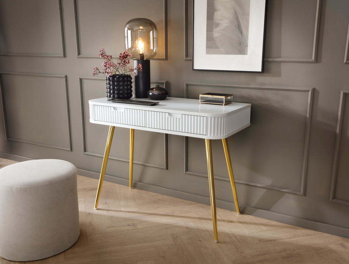 DRESSING TABLE ZOVA WHITEProduct description Dimensions Width 103cm Height 80cm Depth 49cm Details Colour white Material Laminated board 18mm / MDF-board 18mm Veneer ABS edges Legs Metal, in black (65cm) Warranty 24 monthsUncategorizedAnna Furniture