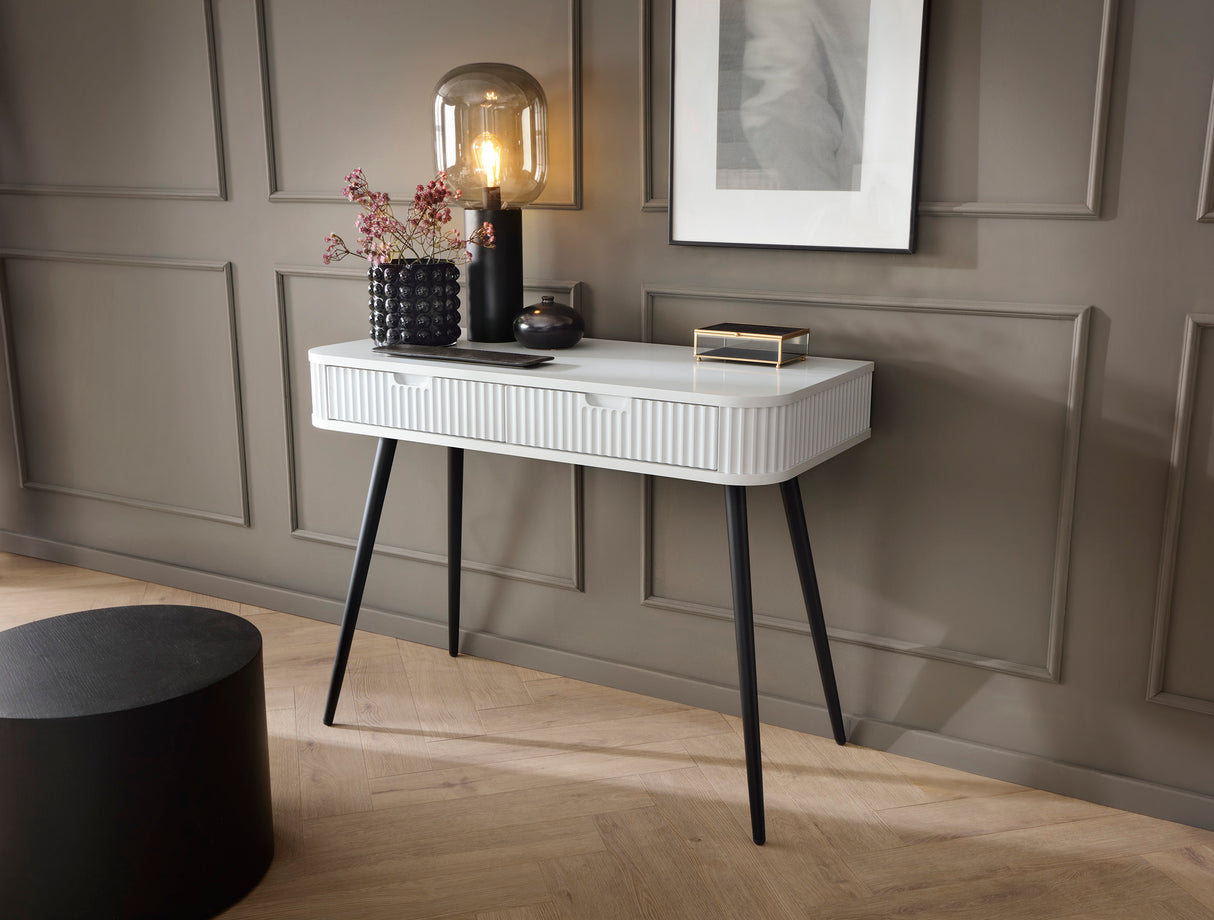 DRESSING TABLE ZOVA WHITEProduct description Dimensions Width 103cm Height 80cm Depth 49cm Details Colour white Material Laminated board 18mm / MDF-board 18mm Veneer ABS edges Legs Metal, in black (65cm) Warranty 24 monthsUncategorizedAnna Furniture