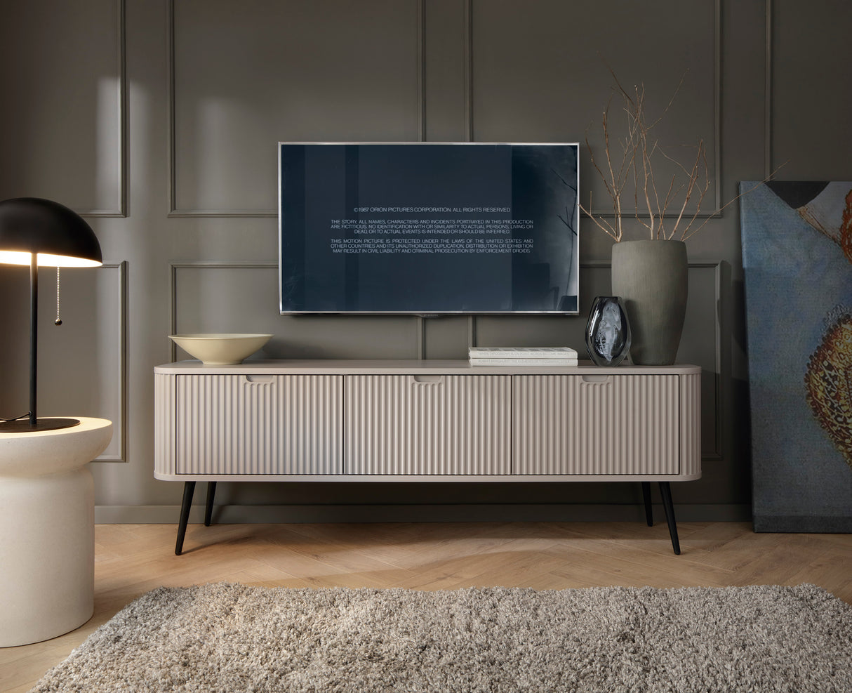 TV Stand ZOVA 01 CASHMEREProduct description Dimensions Width 168cm Height 56cm Depth 39cm Details Colour cashmere Material Laminated board 18mm / MDF-board 18mm Veneer ABS edges Legs Metal, in black (23cm) Warranty 24 monthsUncategorizedAnna Furniture