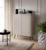 Storage cabinet ZOVA 03 CASHEMEREProduct description Dimensions Width 103cm Height 129cm Depth 39cm Details Colour cashmere Material Laminated board 18mm / MDF-board 18mm Veneer ABS edges Legs Metal, in black (23cm) Warranty 24 monthsUncategorizedAnna Fur