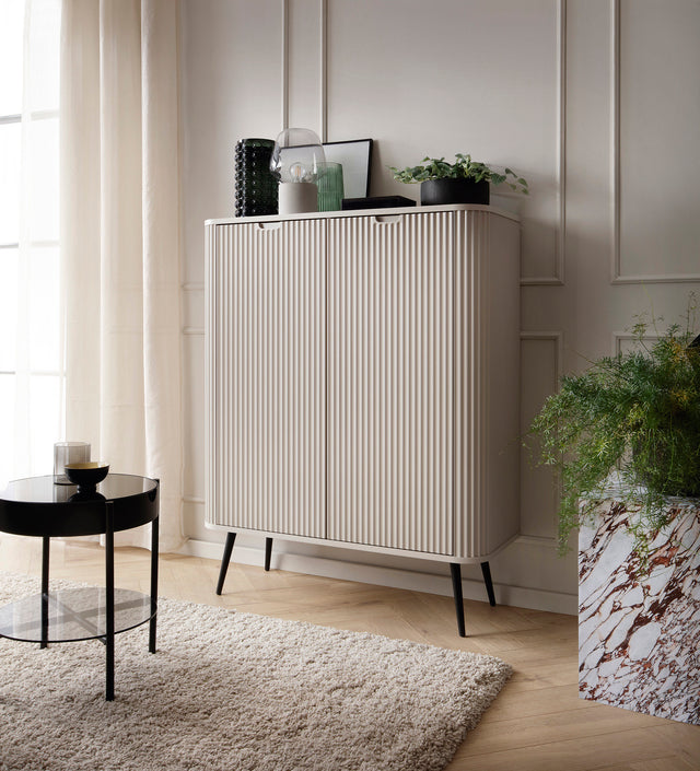 Storage cabinet ZOVA 03 CASHEMEREProduct description Dimensions Width 103cm Height 129cm Depth 39cm Details Colour cashmere Material Laminated board 18mm / MDF-board 18mm Veneer ABS edges Legs Metal, in black (23cm) Warranty 24 monthsUncategorizedAnna Fur