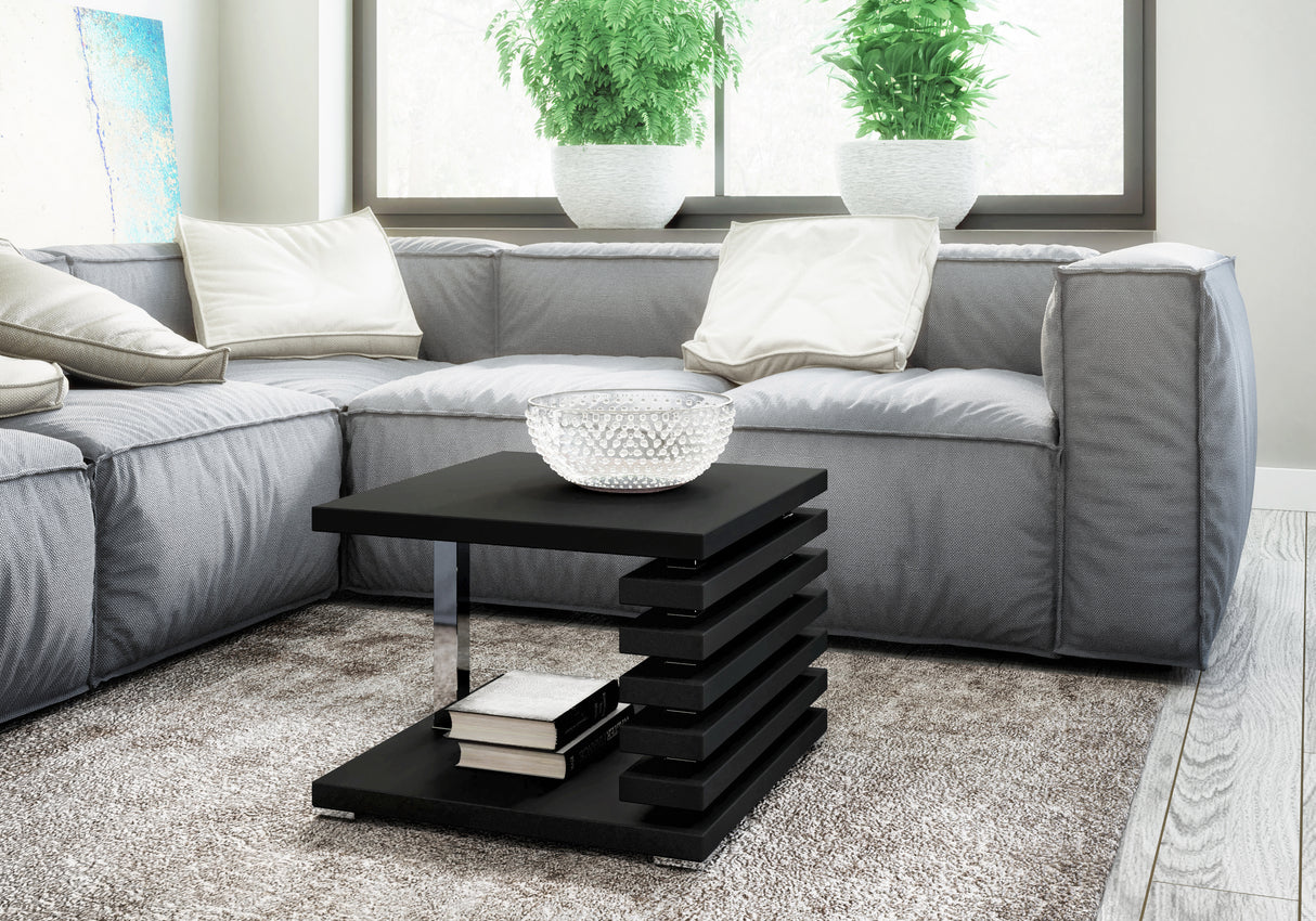 COFFEE TABLE KYOTO BLACKIntroducing COFFEE TABLE KYOTO, an ideal addition to any corner or regular sofa. Its sleek and contemporary rung-shaped structure, adorned with metallic accents, makes it a standout piece. Constructed from a 32mm thick board, this